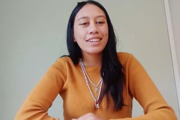 Manawa Honey NZ Staff Member In Orange Sweater