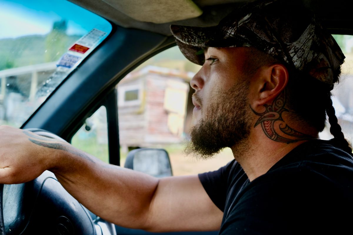 Manuka Honey beekeeper in truck of Manawa Honey NZ of Ruatahuna
