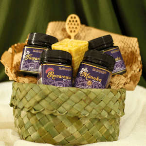 Featuring Manawa Honey Gift Basket Produced By Manawa Honey NZ Contains Premium Selection of Honey Complimented By Beeswax Candle and Dipper.
